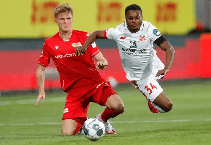 德甲对决：柏林联合残阵死守主场，多特蒙德客场冲冠破局